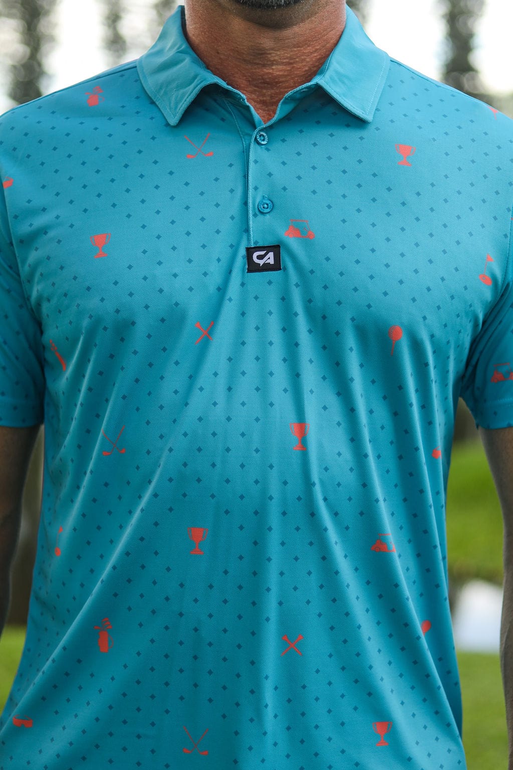 Custom Apparel Men's Golf Shirt | Statement | Teal & Orange